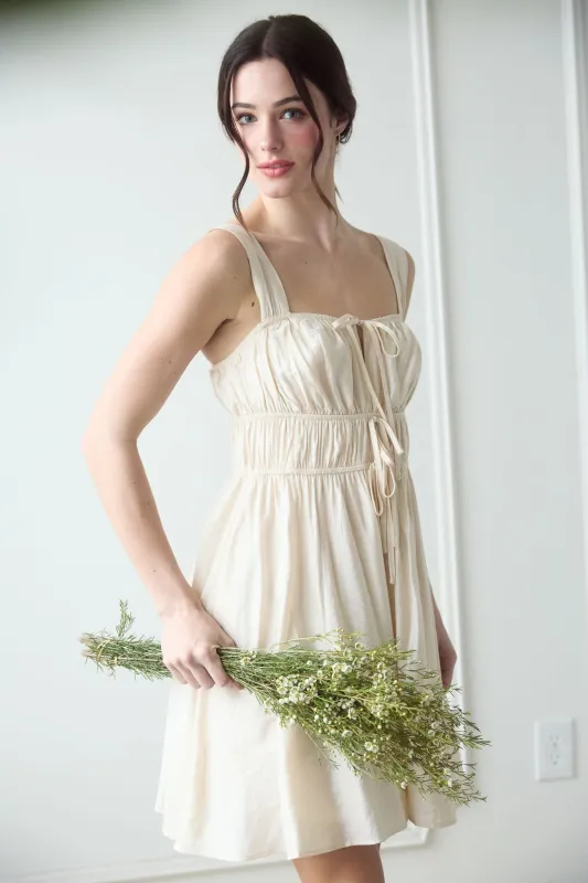 FRONT TIE GATHERED WAIST SLEEVELESS MINI DRESS sold by Blu Pepper