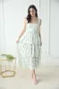 FLORAL TIE STRAP RUFFLE TIERED MIDI DRESS sold by Blu Pepper