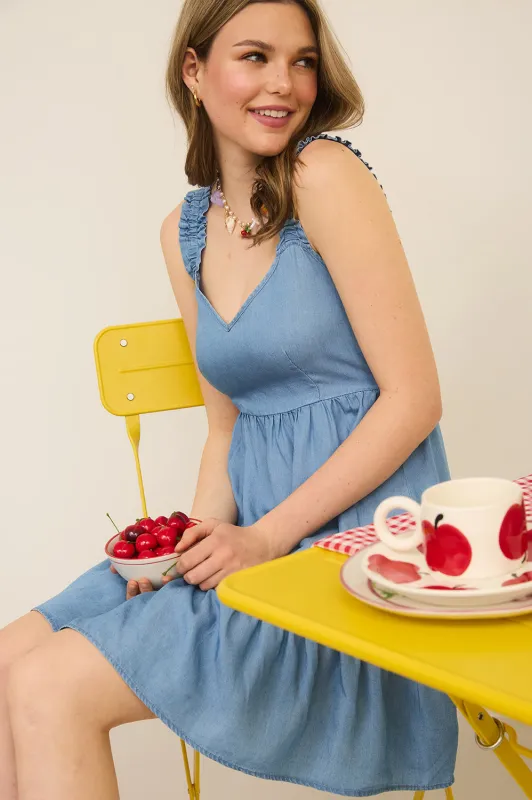 RUFFLE HEM CHAMBRAY MINI DRESS sold by Blu Pepper