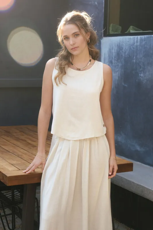 ROUND NECK SLEEVELESS SIDE BUTTON LINEN TOP sold by Blu Pepper