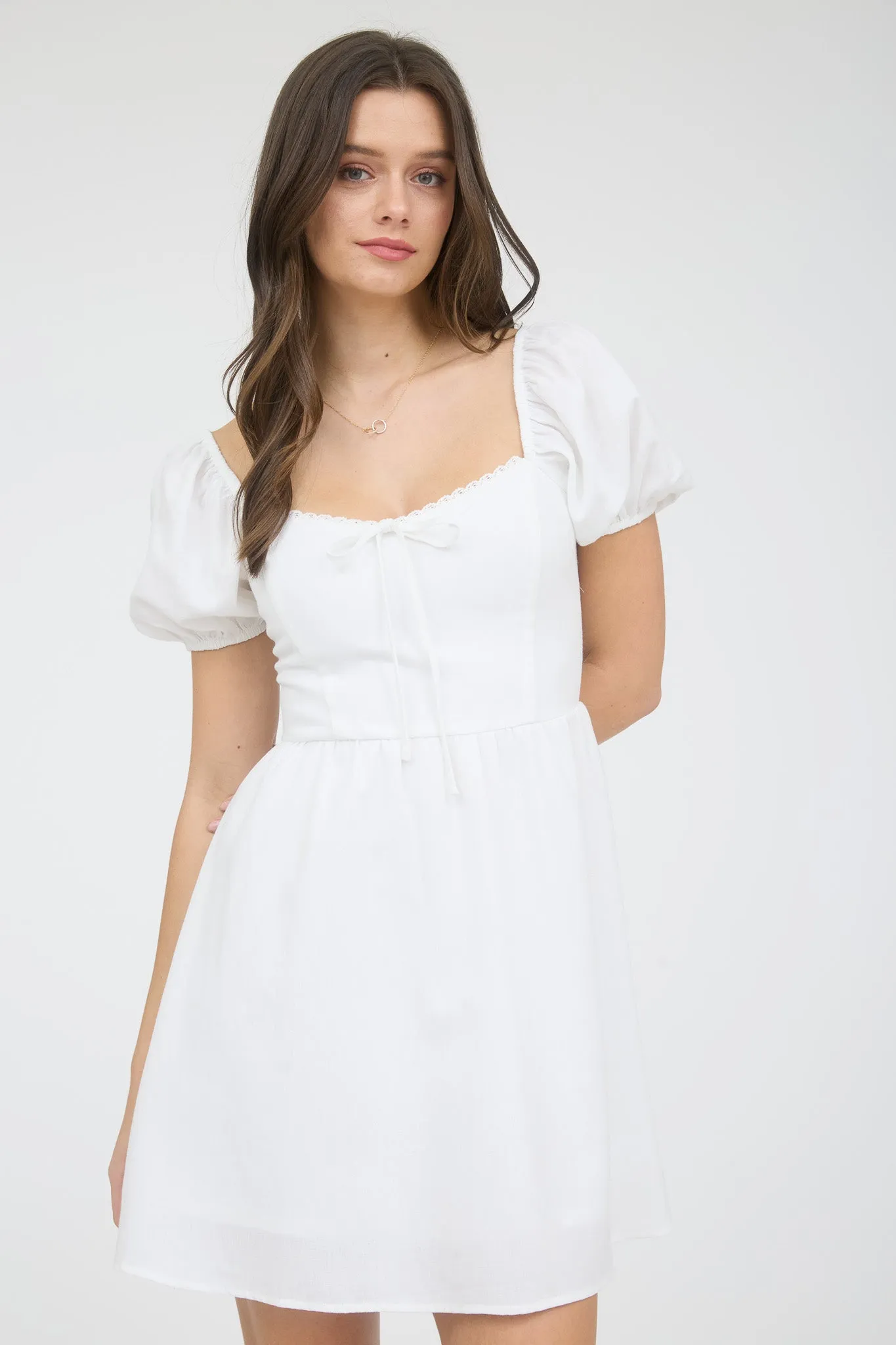 PUFF SLEEVE LACE TRIM FRONT TIE MINI DRESS sold by Blu Pepper