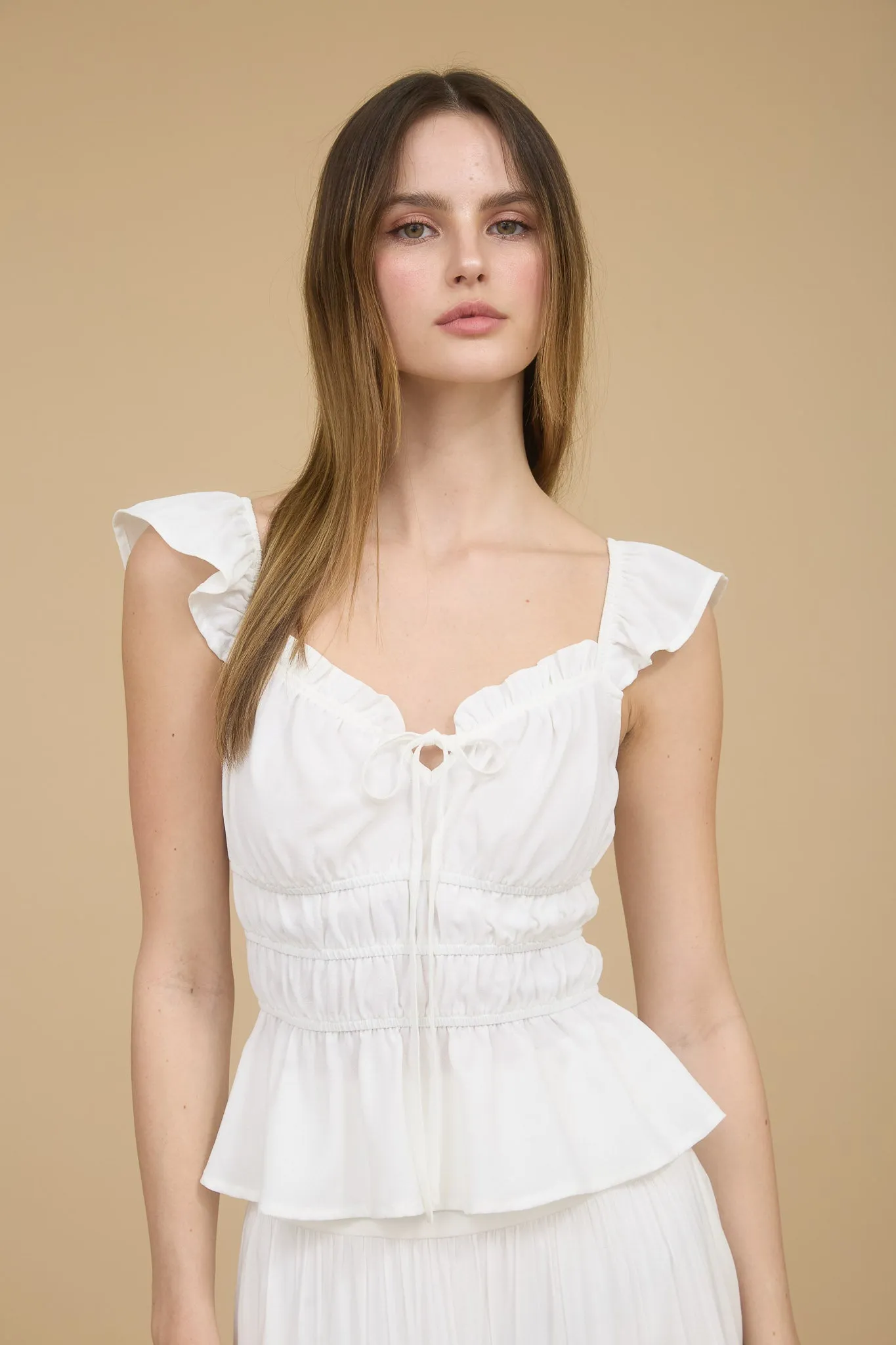 RUFFLE TRIM FRONT TIE SHIRRED WAIST BLOUSE sold by Blu Pepper product image thumbnail 4