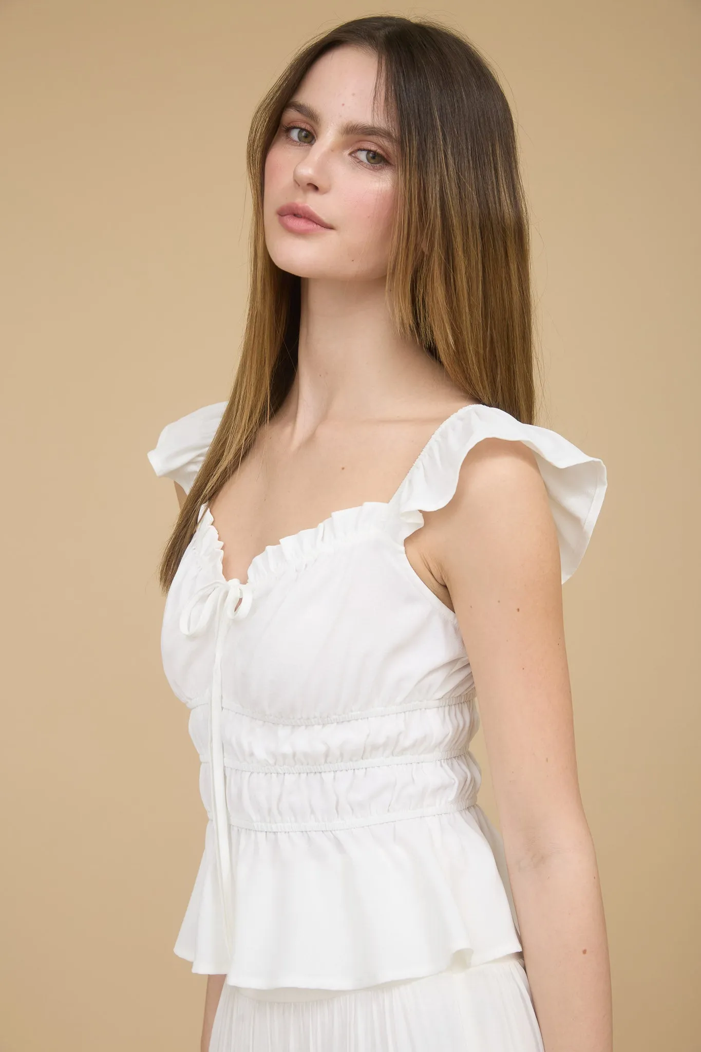 RUFFLE TRIM FRONT TIE SHIRRED WAIST BLOUSE sold by Blu Pepper product image thumbnail 3