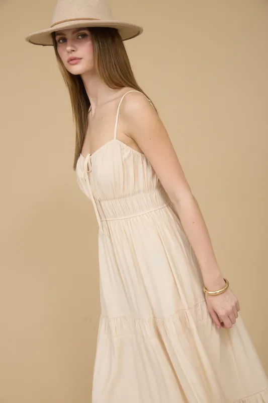 SHIRRED FRONT TIE SLEEVELESS TIERED MIDI DRESS sold by Blu Pepper