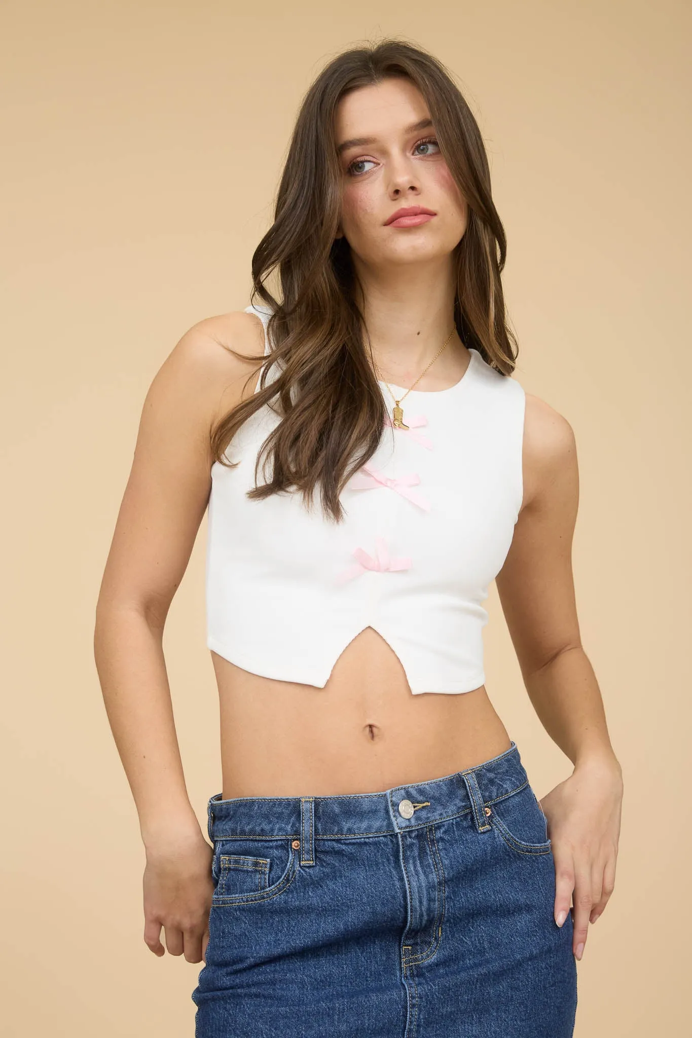 BOW DETAIL SLEEVELESS SPLIT HEM KNIT CROP TOP sold by Blu Pepper product image thumbnail 4