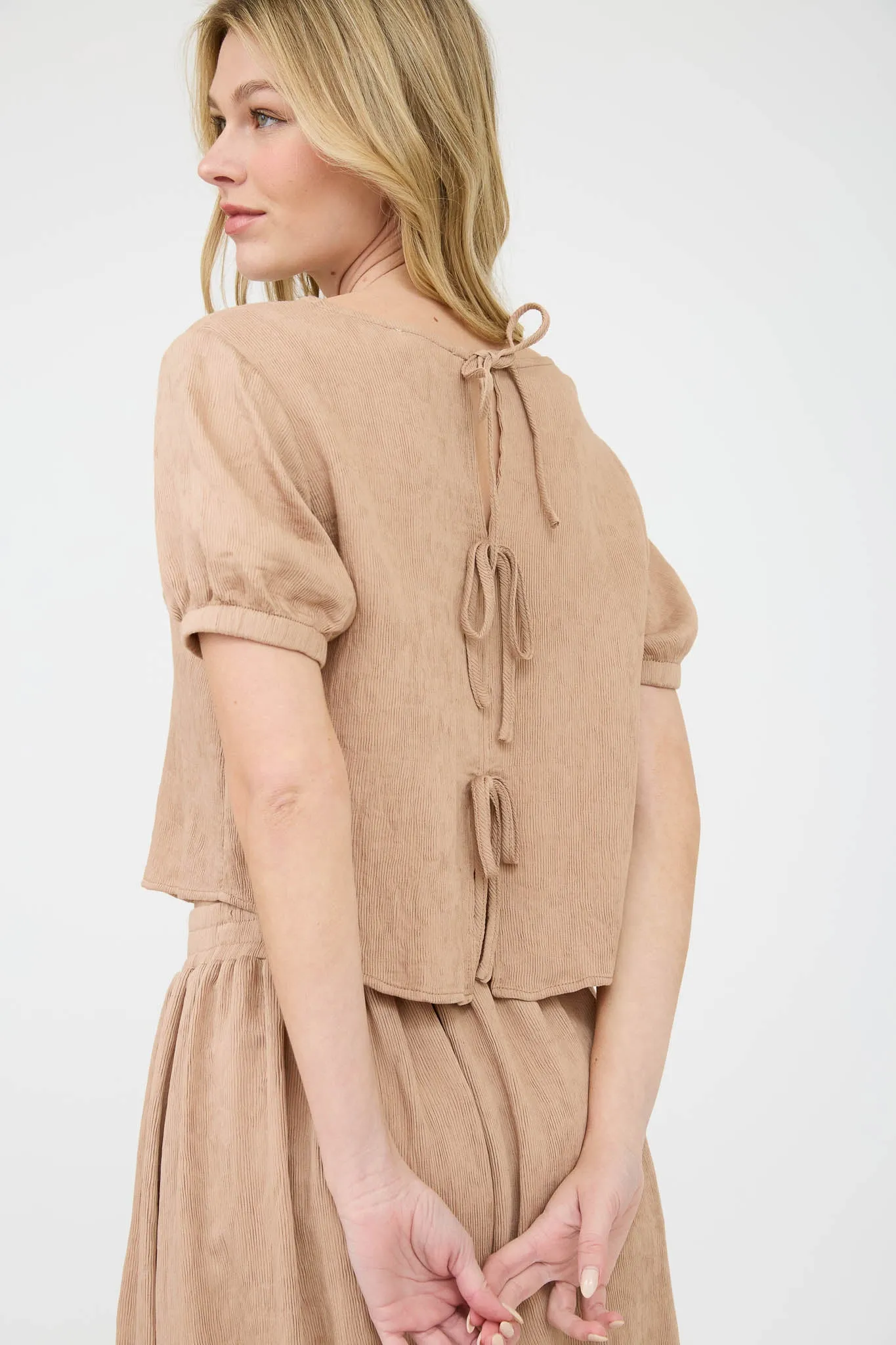 ROUND NECK SHORT PUFF SLEEVE BACK TIE SHIRT sold by Blu Pepper