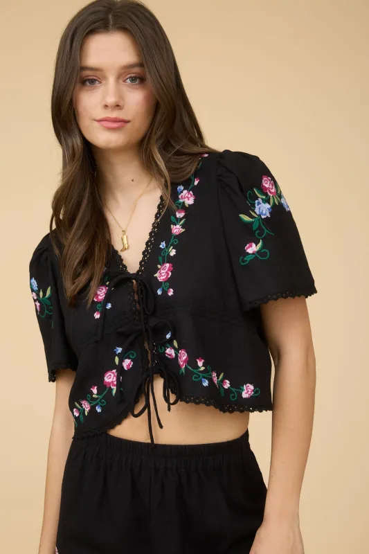 FLORAL EMBROIDERY DETAIL FRONT TIE CROPPED BLOUSE sold by Blu Pepper