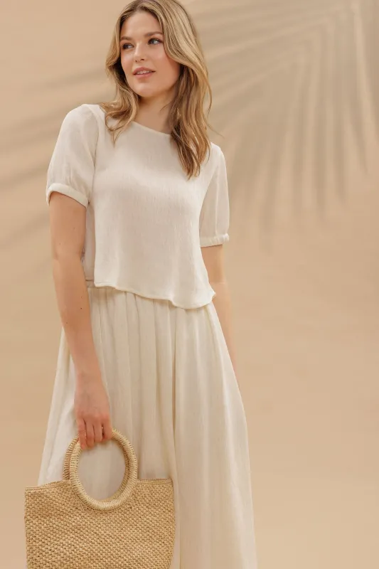 HIGH ELASTIC WAIST CRINKLE KIT MIDI SKIRT sold by Blu Pepper