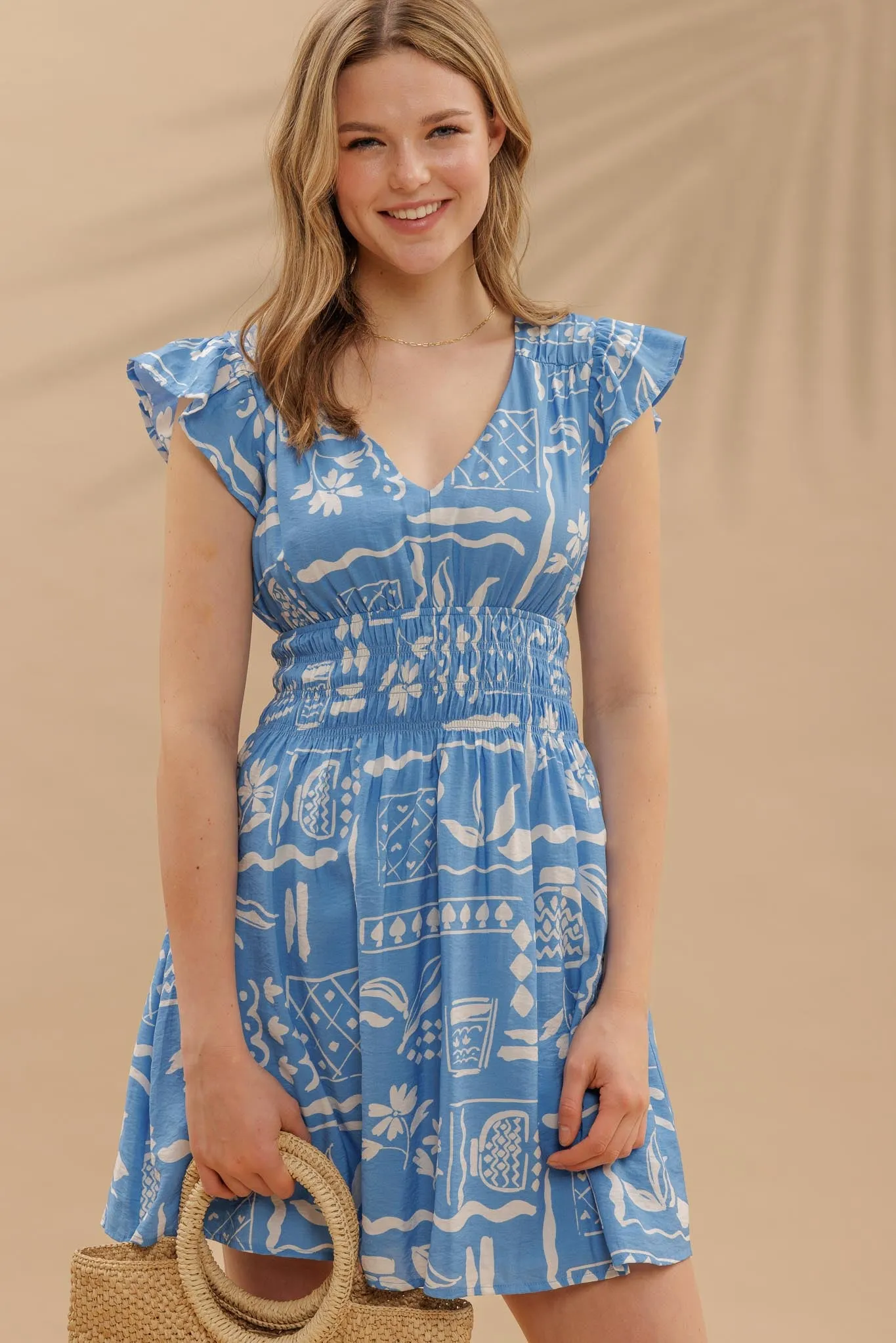 FLORAL LINE PRINT V NECK RUFFLE SLEEVE MINI DRESS sold by Blu Pepper