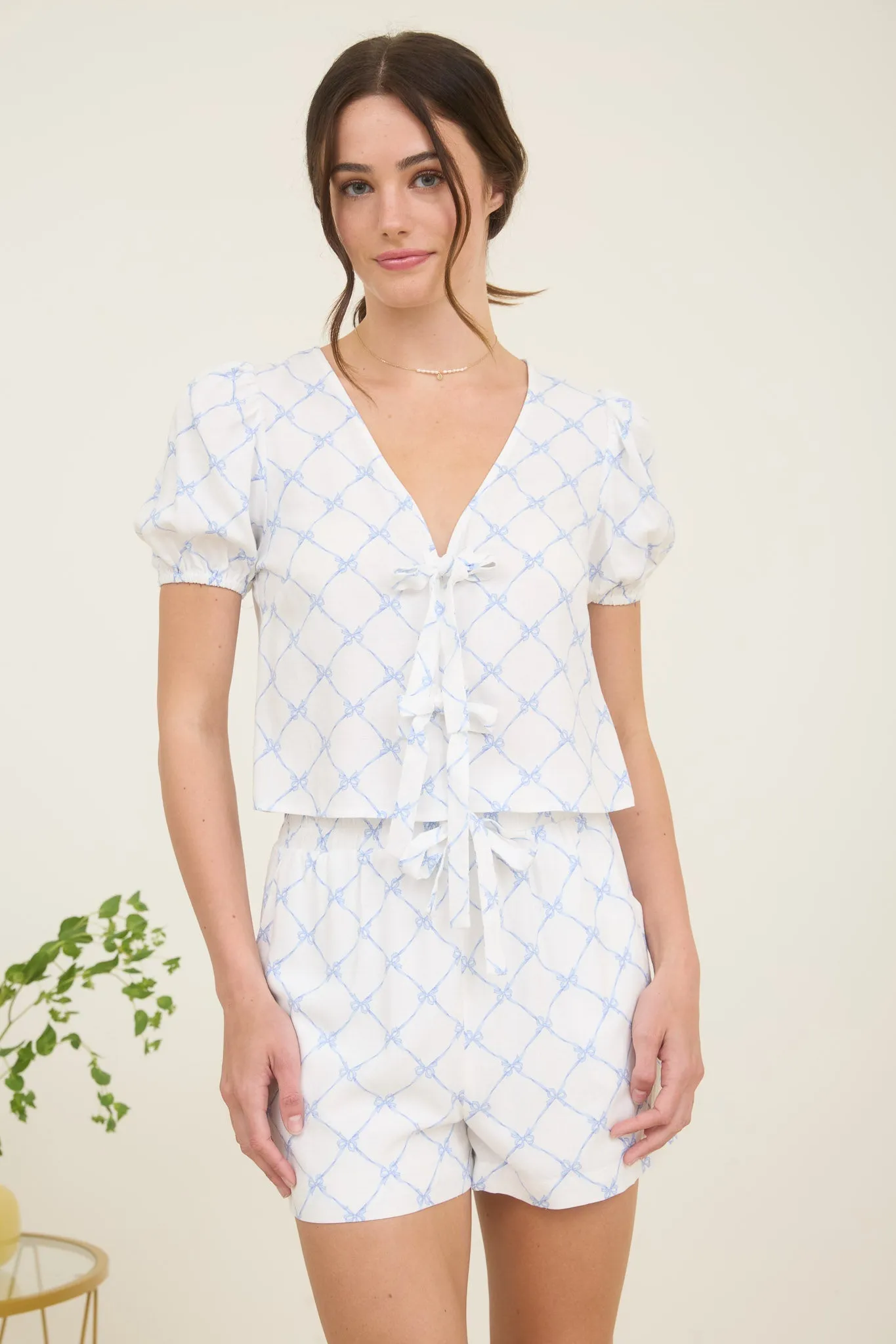 BOW PATTERN FRONT TIE PUFF SLEEVE LINEN BLOUSE sold by Blu Pepper product image thumbnail 4