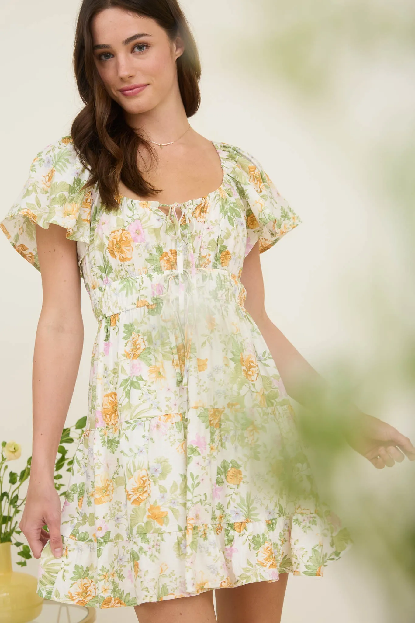 FLORAL FRONT TIE SCOOP NECK TIERED MINI DRESS sold by Blu Pepper