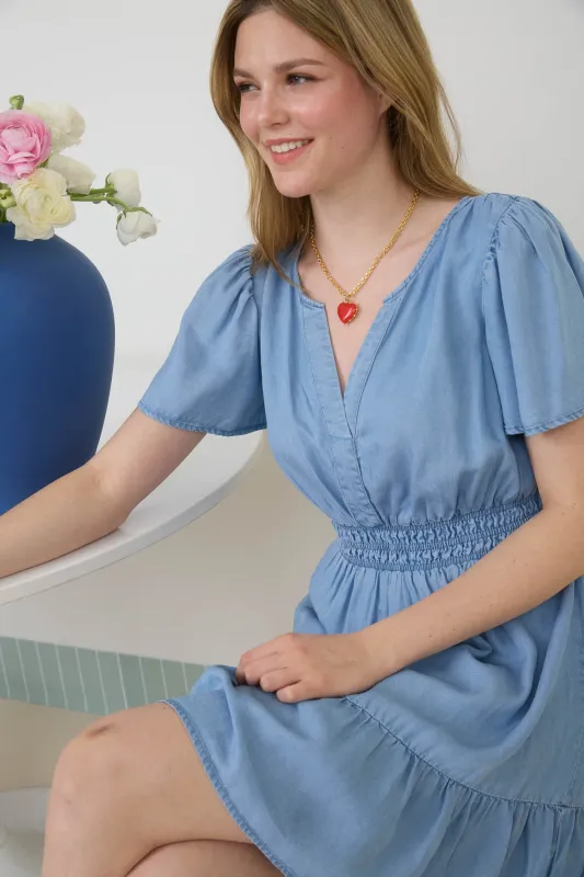 SPLIT NECK FLOUNCE CHAMBRAY MINI DRESS sold by Blu Pepper