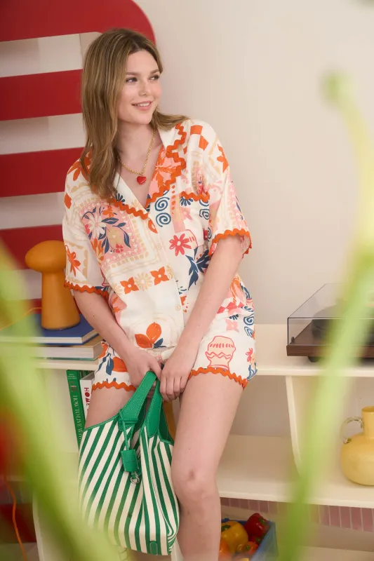 FLORAL AND FRUIT PRINT WAVY TRIM COLLARED SHIRT sold by Blu Pepper