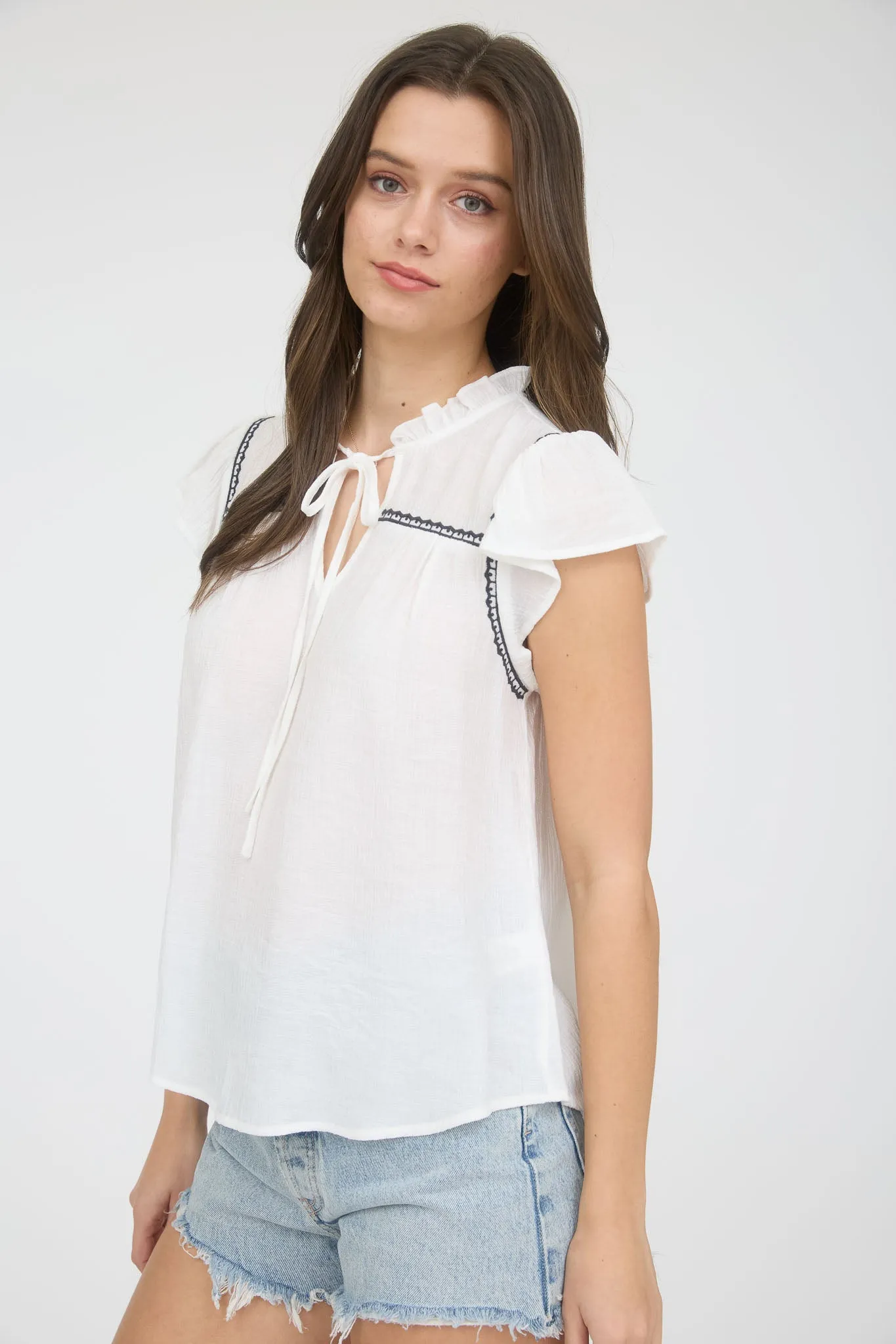 PLUS CONTRAST EMBROIDERY RUFFLE FRONT TIE BLOUSE sold by Blu Pepper product image thumbnail 3