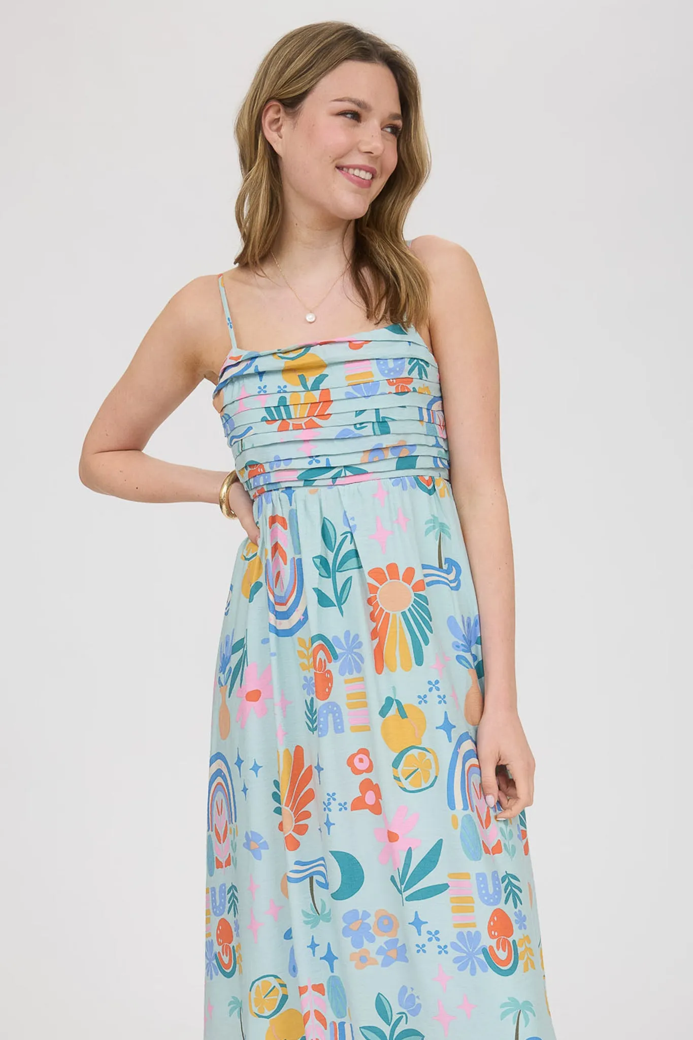 SUMMER PRINT PLEATED BACK BOW MIDI DRESS sold by Blu Pepper