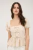 FRONT BOW DETAIL PUFF SLEEVE PEPLUM TOP sold by Blu Pepper