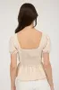 FRONT BOW DETAIL PUFF SLEEVE PEPLUM TOP sold by Blu Pepper