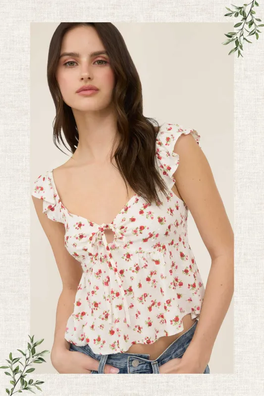 FLORAL CLIP DOT FRONT TIE WITH CUT-OUT CROP TOP sold by Blu Pepper