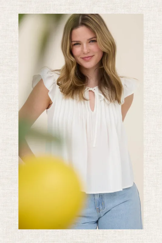 FRONT TIE PLEATED RUFFLE SLEEVE BLOUSE sold by Blu Pepper
