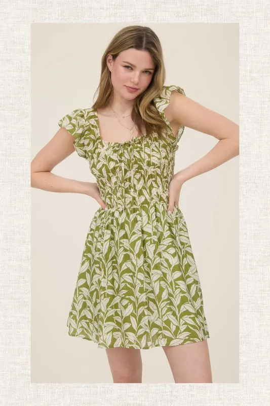 LEAF PRINT FRONT TIE SMOCKED BODICE MINI DRESS sold by Blu Pepper