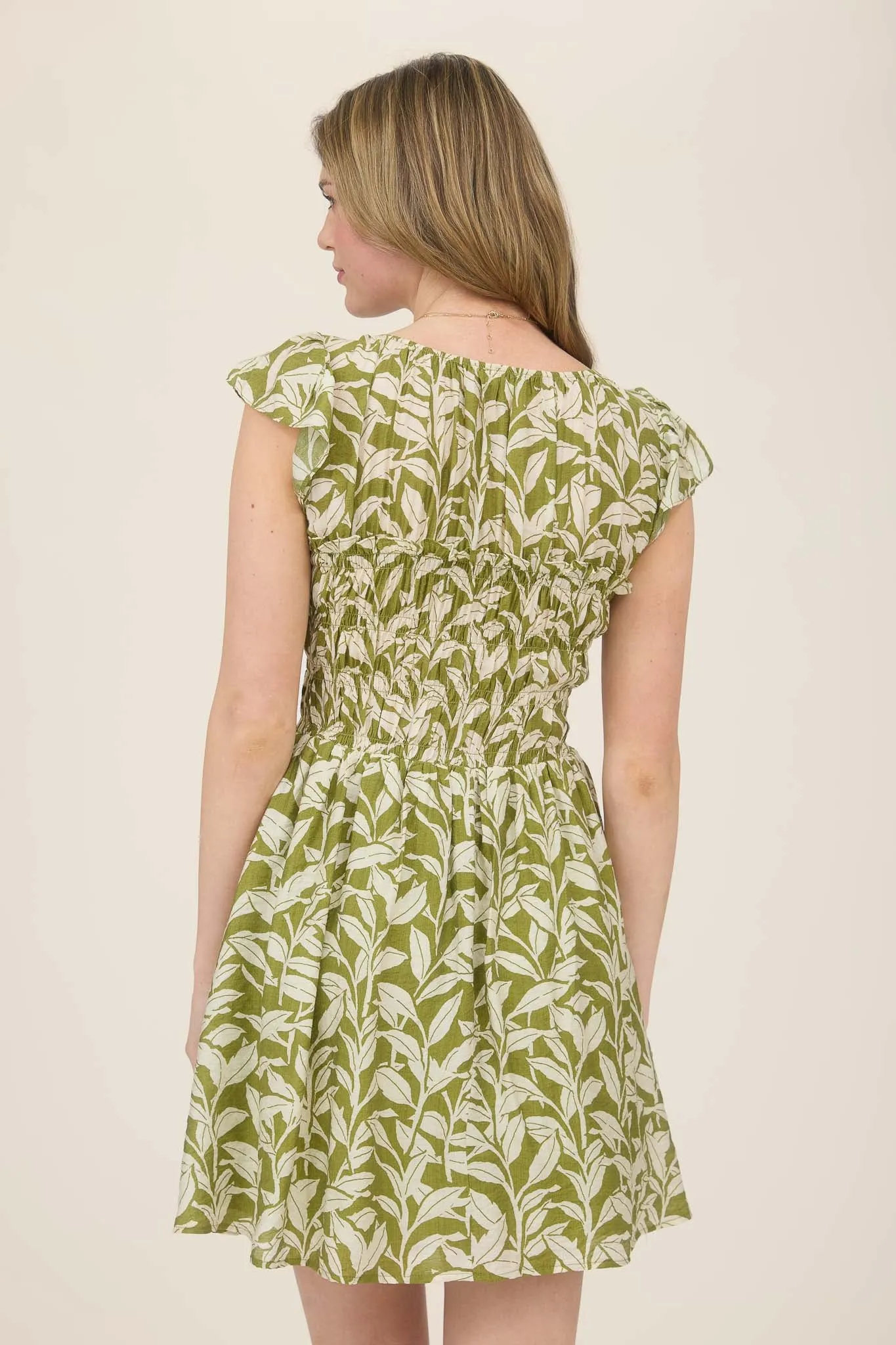 LEAF PRINT FRONT TIE SMOCKED BODICE MINI DRESS sold by Blu Pepper product image thumbnail 2