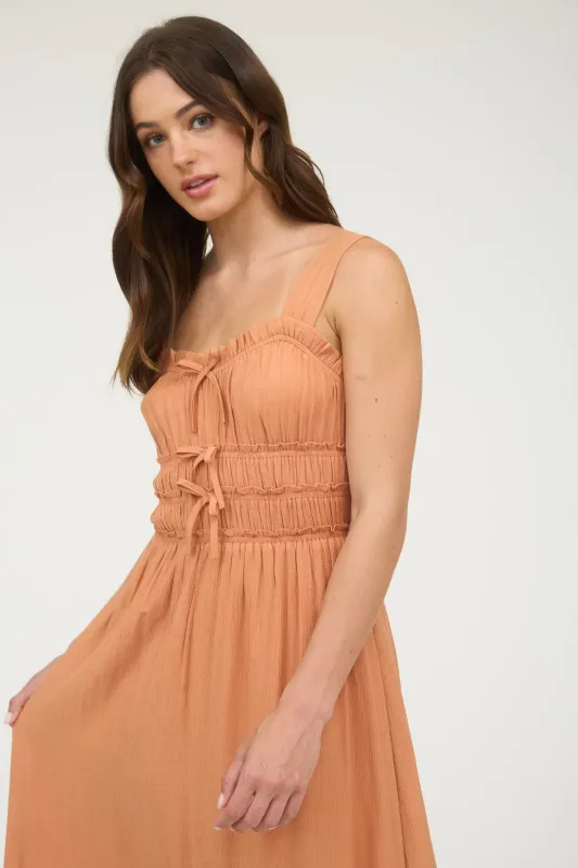 SHIRRED FRONT TIE DETAIL SLEEVELESS MIDI DRESS sold by Blu Pepper