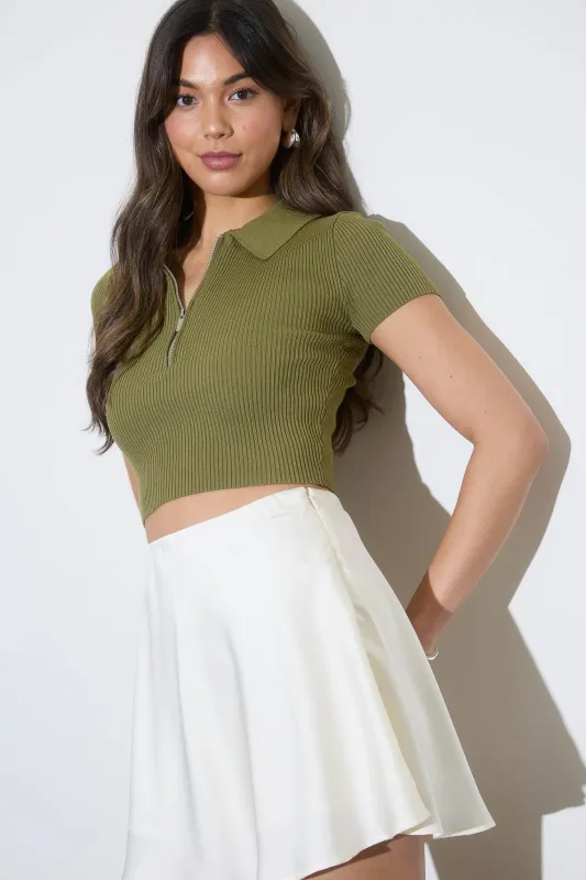 COLLARED HALF ZIP SHORT SLEEVE KNIT CROP TOP sold by Blu Pepper