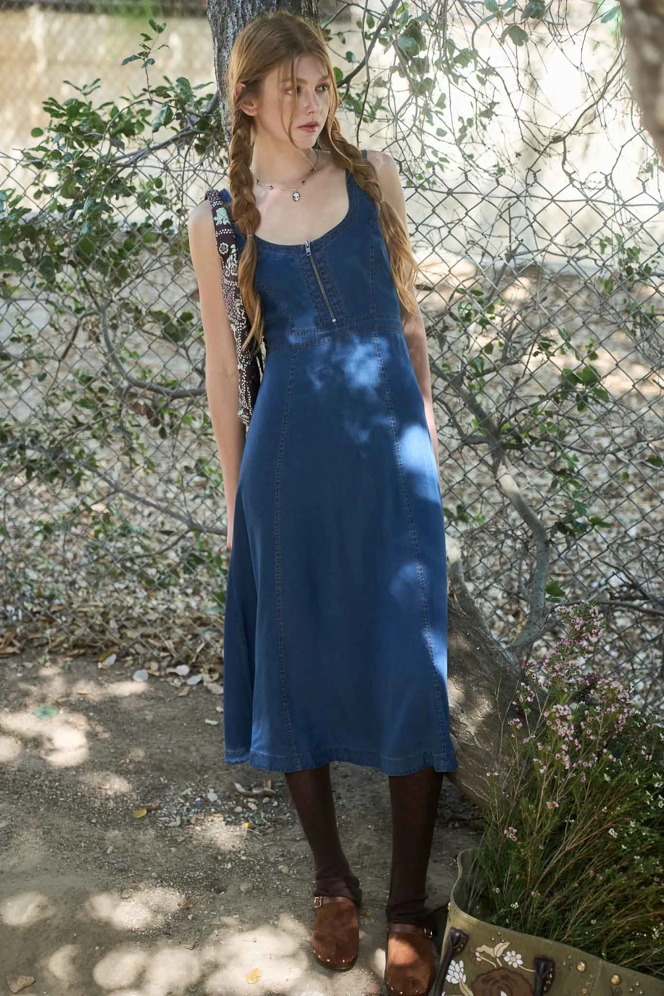 FRONT ZIP SLEEVELESS DENIM MIDI DRESS sold by Blu Pepper