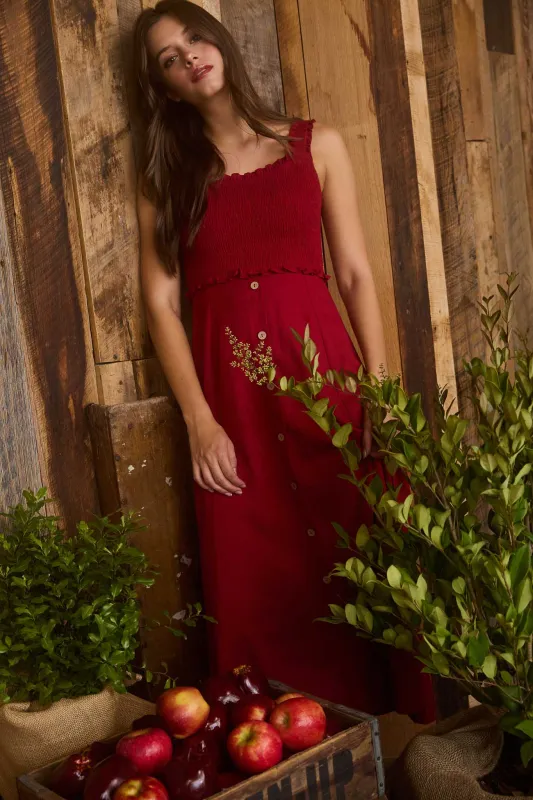 SMOCKED SLEEVELESS BUTTON DOWN MIDI DRESS sold by Blu Pepper
