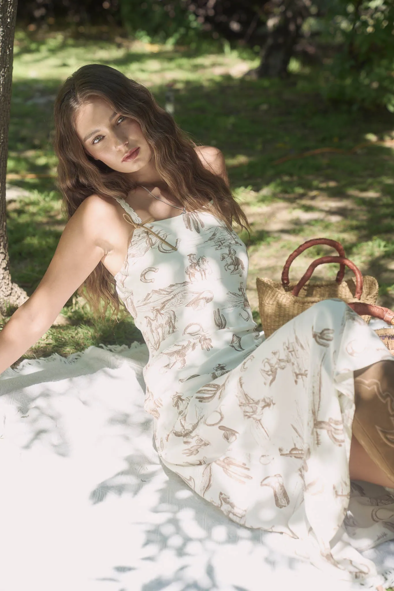 WESTERN PRINT SPAGHETTI STRAP WITH BOW MIDI DRESS (PRE-ORDER) sold by Blu Pepper