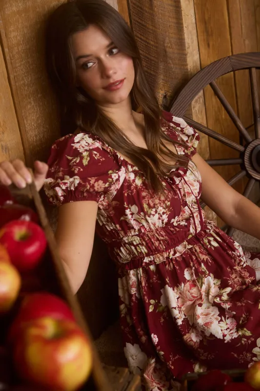 FLORAL RUFFLE TRIM VELVET FRONT TIE MINI DRESS sold by Blu Pepper