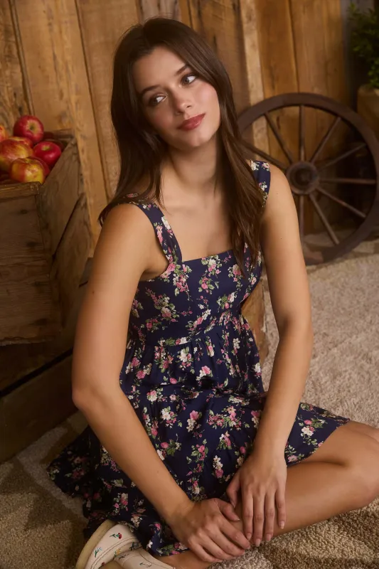 FLORAL SLEEVELESS TIERED MINI DRESS sold by Blu Pepper