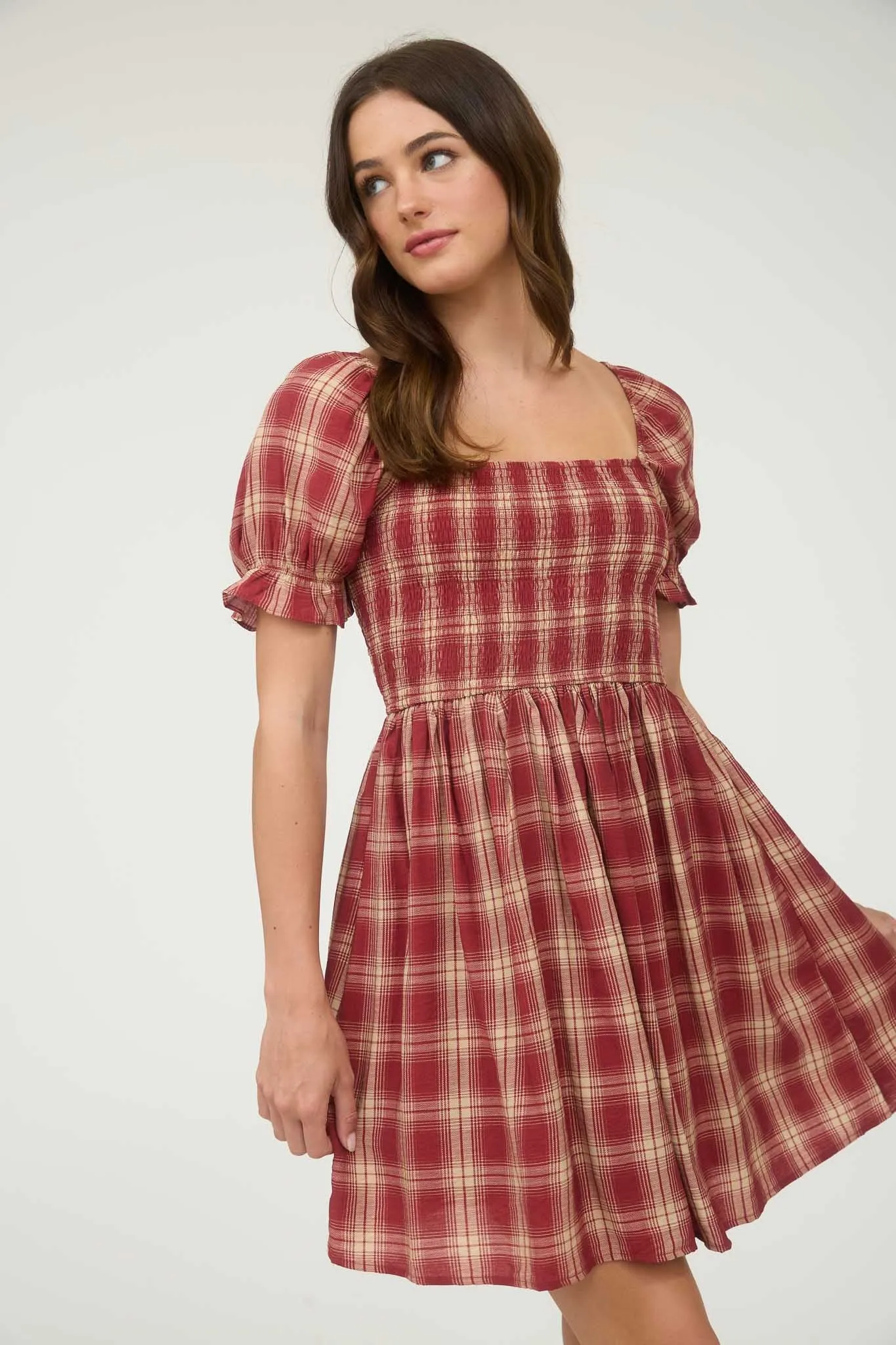PLAID SMOCKED PUFF SLEEVE MIDI DRESS sold by Blu Pepper