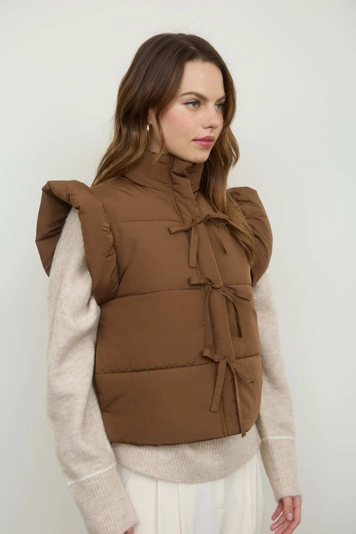 FLUTTER SLEEVE BOW DETAIL ZIP-UP PUFFER VEST sold by Blu Pepper product image thumbnail 3