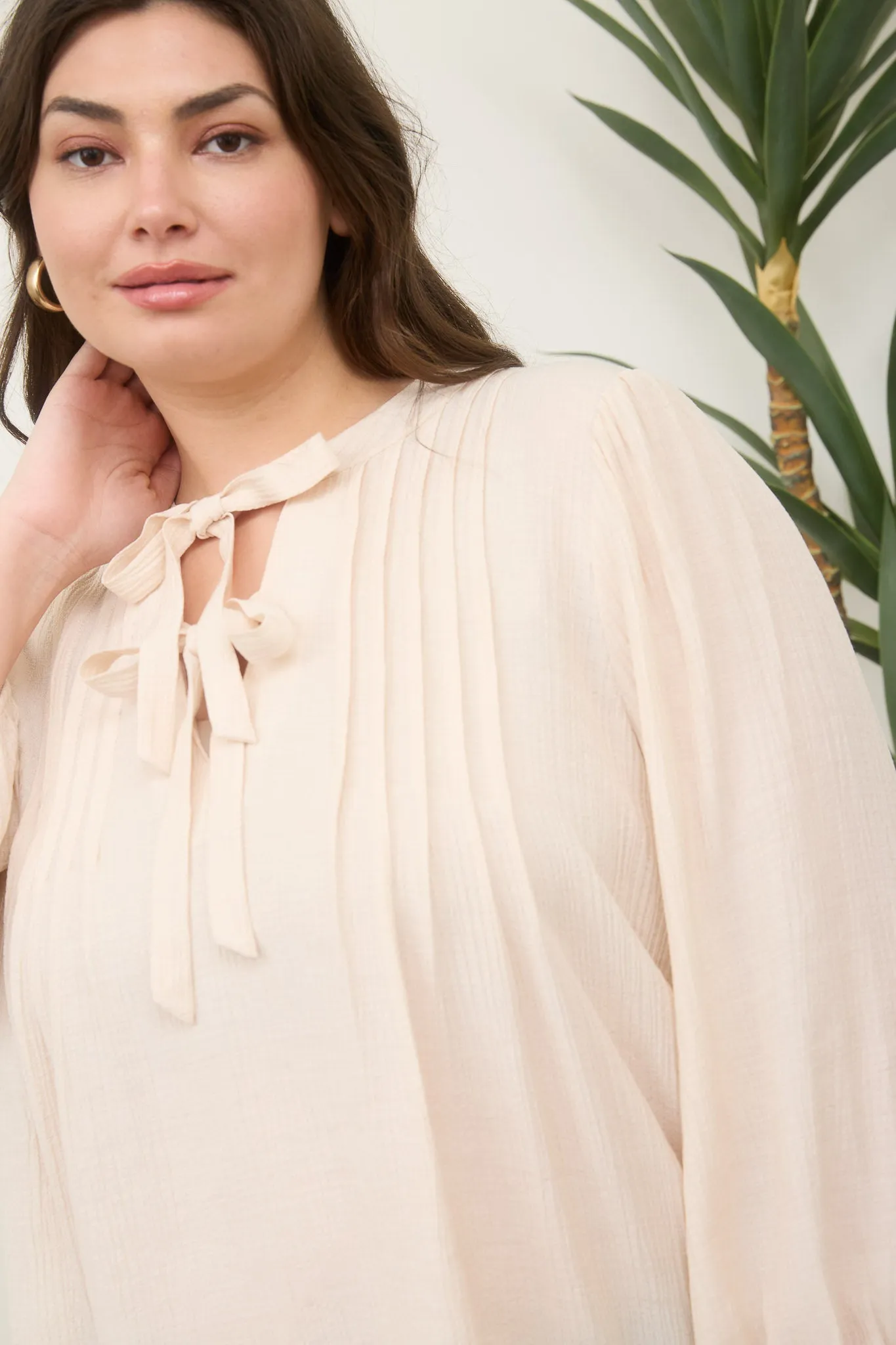 PLUS FRONT TIE PLEATED FRONT 3/4 SLEEVE TOP sold by Blu Pepper