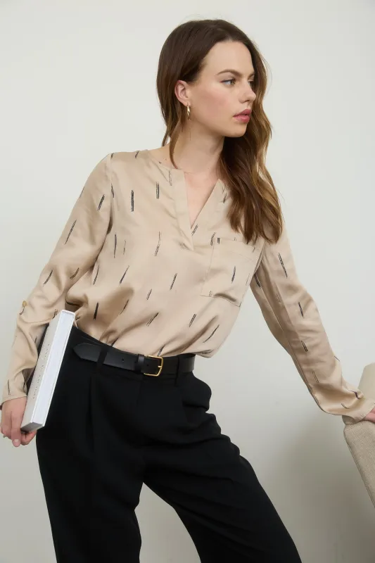 BRUSH STROKE PRINT 3/4 TAB SLEEVE SATIN TOP sold by Blu Pepper