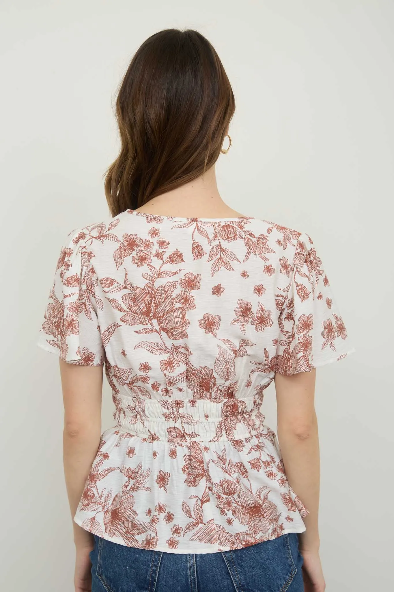 FLORAL SHIRRED WAIST SHORT BELL SLEEVE BLOUSE sold by Blu Pepper product image thumbnail 2