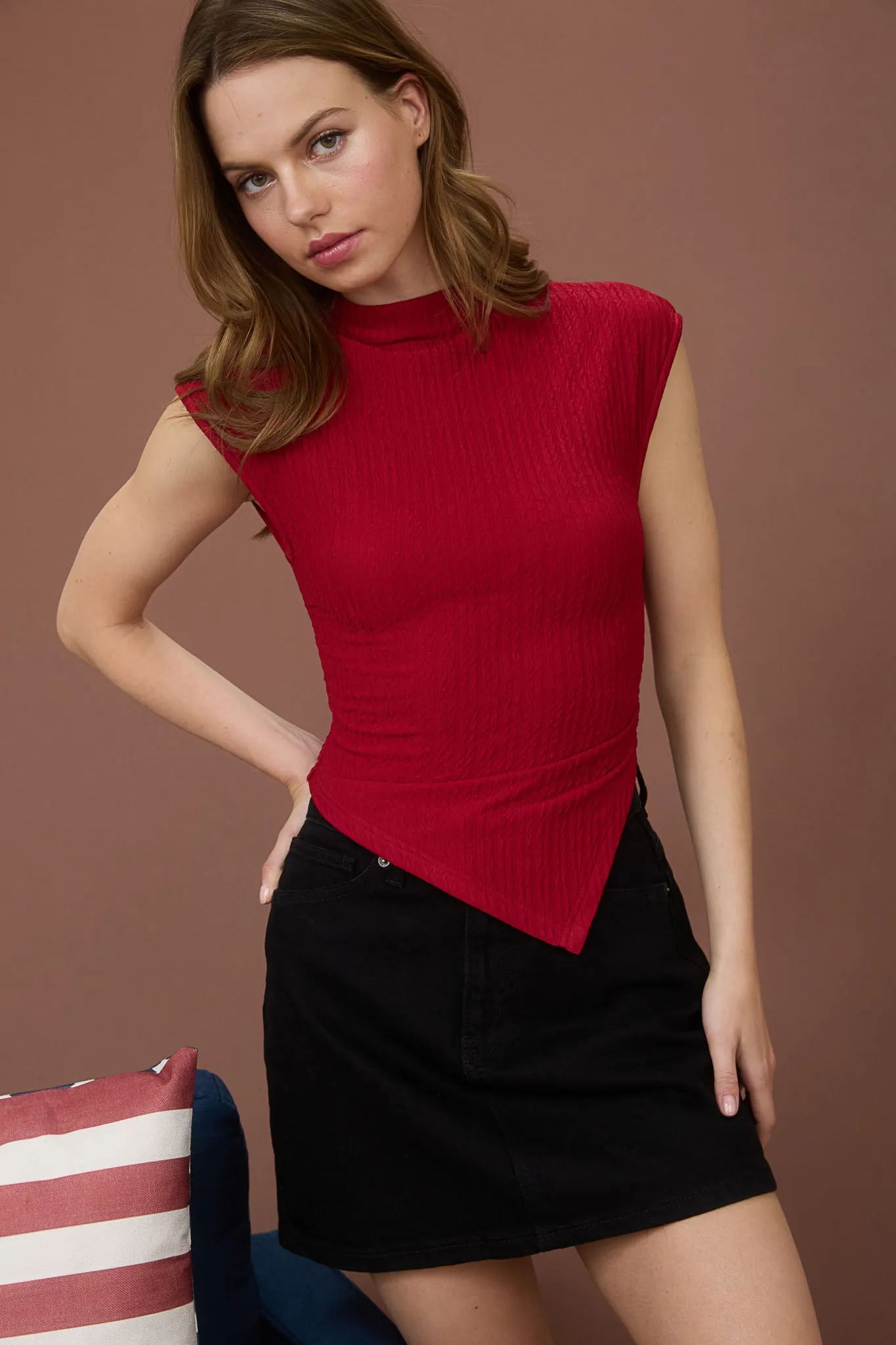 ASYMMETRICAL HEM MOCK NECK SLEEVELESS KNIT TOP sold by Blu Pepper