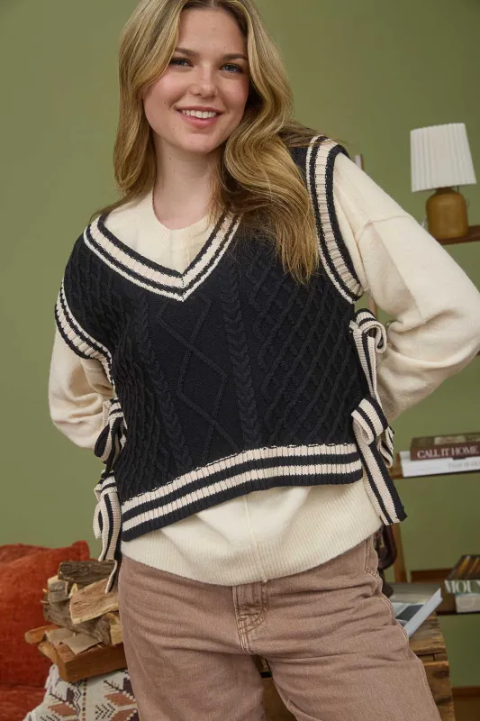 CONTRAST LINE TRIM SIDE TIE KNIT SWEATER VEST sold by Blu Pepper
