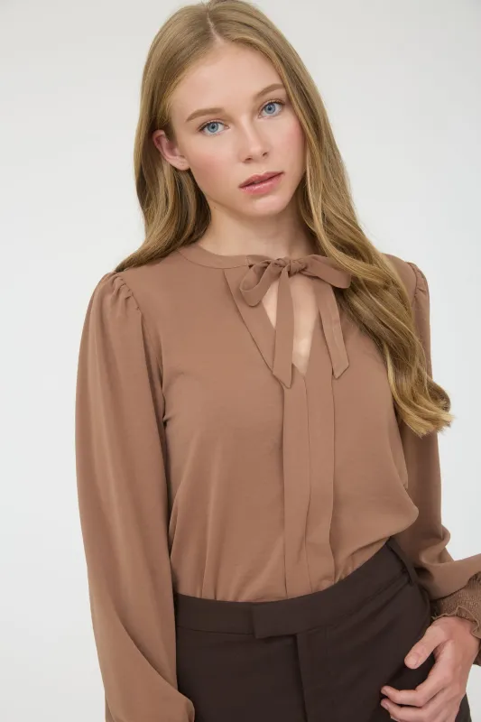 NECKTIE LONG SLEEVE WITH SMOCKED CUFF TOP sold by Blu Pepper