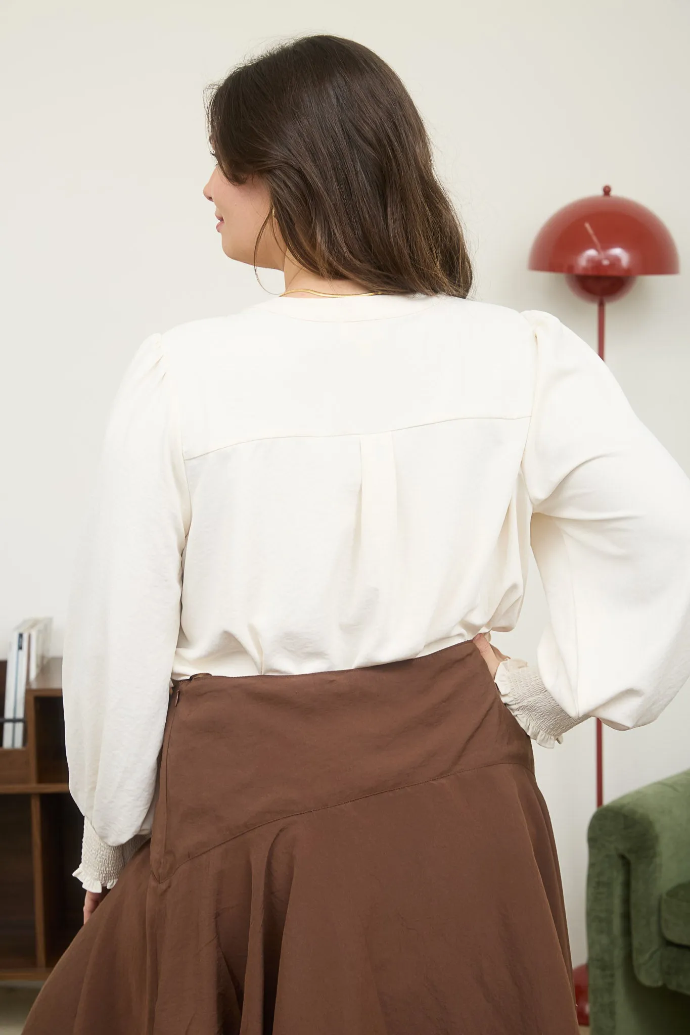 PLUS NECKTIE LONG SLEEVE WITH SMOCKED CUFF TOP sold by Blu Pepper product image thumbnail 2