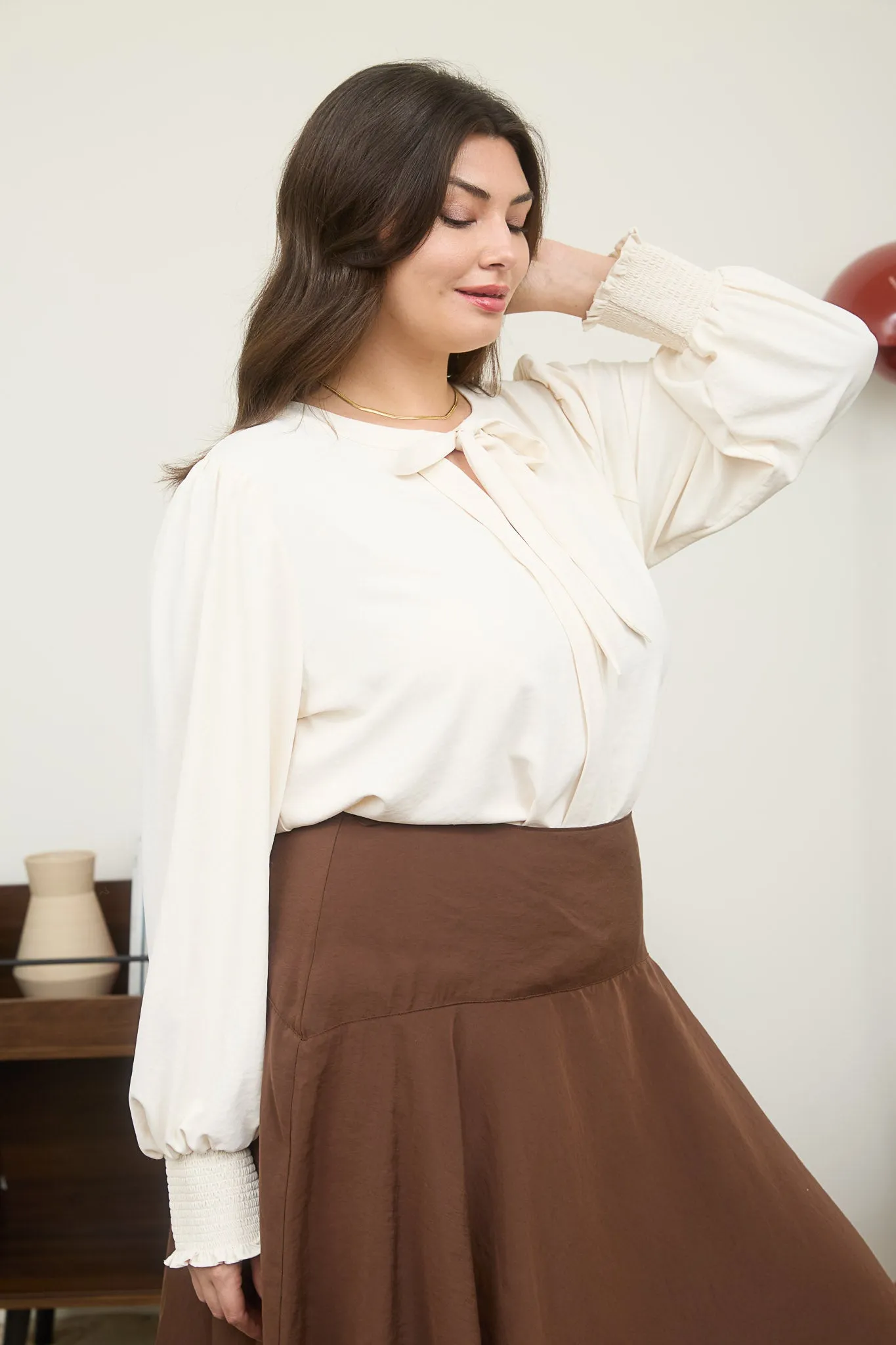 PLUS NECKTIE LONG SLEEVE WITH SMOCKED CUFF TOP sold by Blu Pepper product image thumbnail 3
