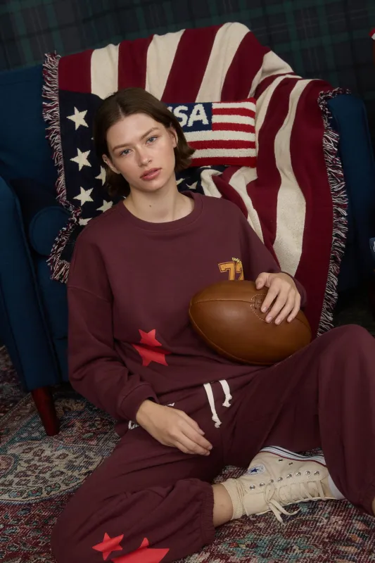 SPORTS CLUB GRAPHIC LONG SLEEVE KNIT TOP sold by Blu Pepper