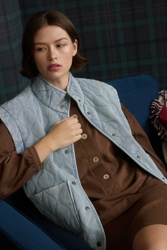 WASHED DENIM QUILTED BUTTON DOWN VEST (PRE-ORDER) sold by Blu Pepper