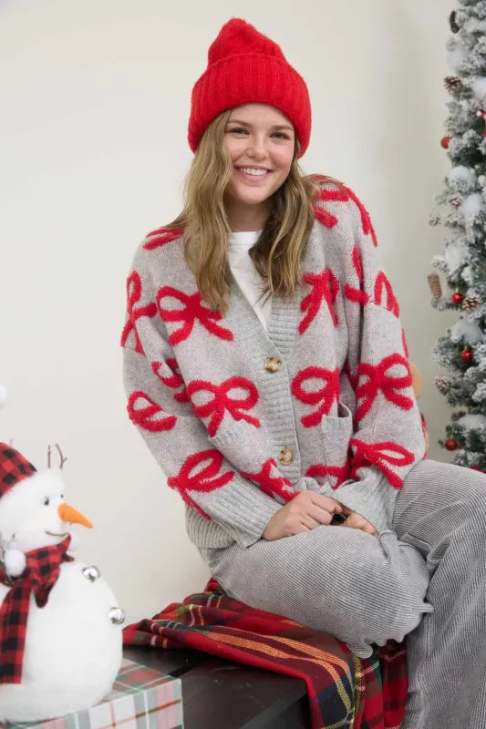 BOW PATTERN BUTTON DOWN KNIT CARDIGAN sold by Blu Pepper