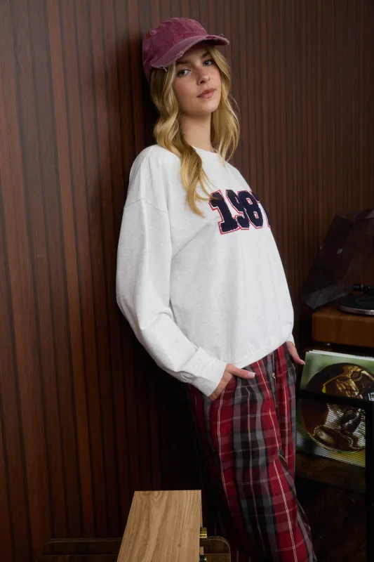 1987 LONG SLEEVE EXTENDED SHOULDER KNIT TOP sold by Blu Pepper