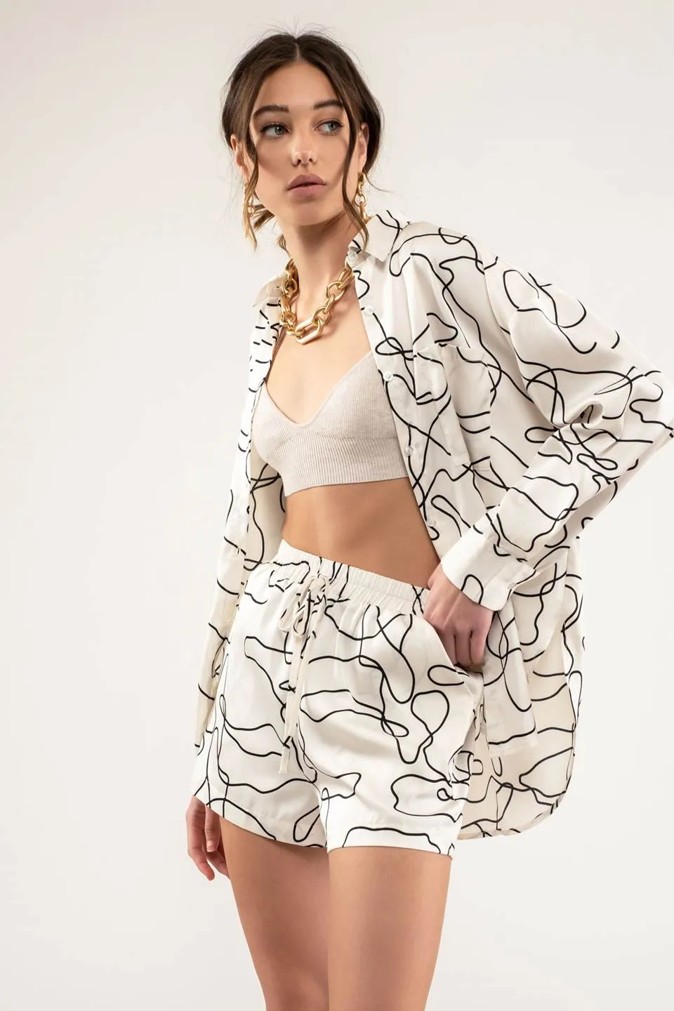 ABSTRACT PRINT BUTTON UP sold by Blu Pepper