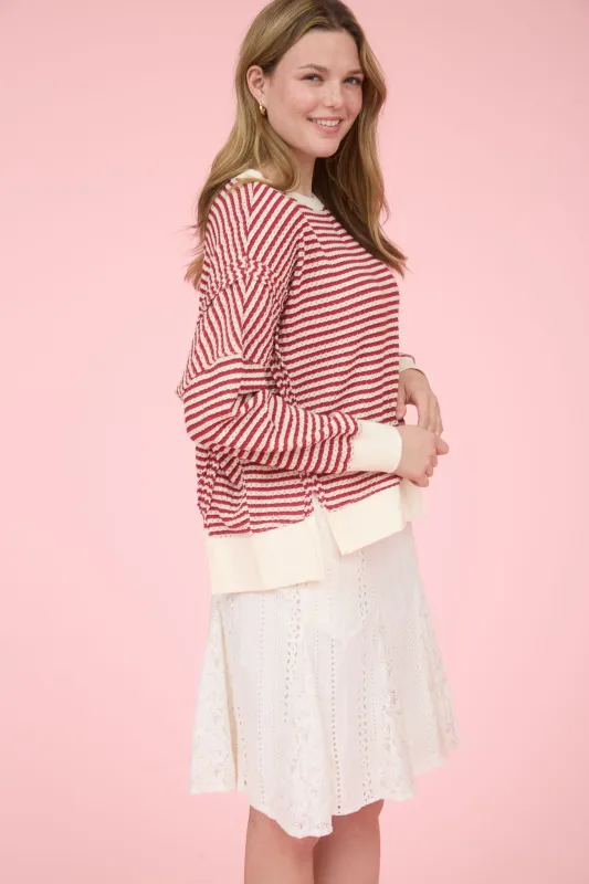 STRIPE EXPOSED SEAM SPLIT HEM LONG SLEEVE KNIT TOP sold by Blu Pepper