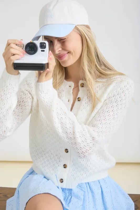 EYELET KNIT PATTERN BUTTON DOWN CARDIGAN sold by Blu Pepper