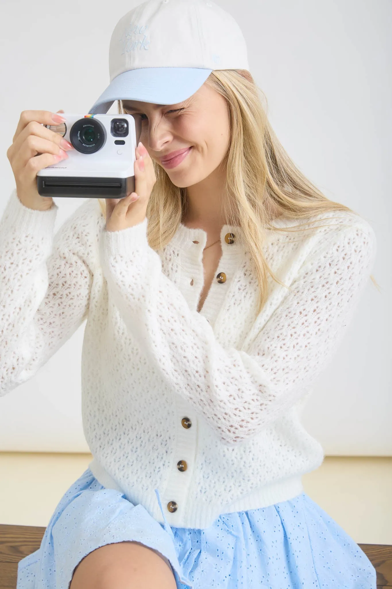 EYELET KNIT PATTERN BUTTON DOWN CARDIGAN sold by Blu Pepper